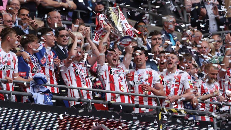 Sunderland celebrate after beating Wycombe in the League One playoff final
