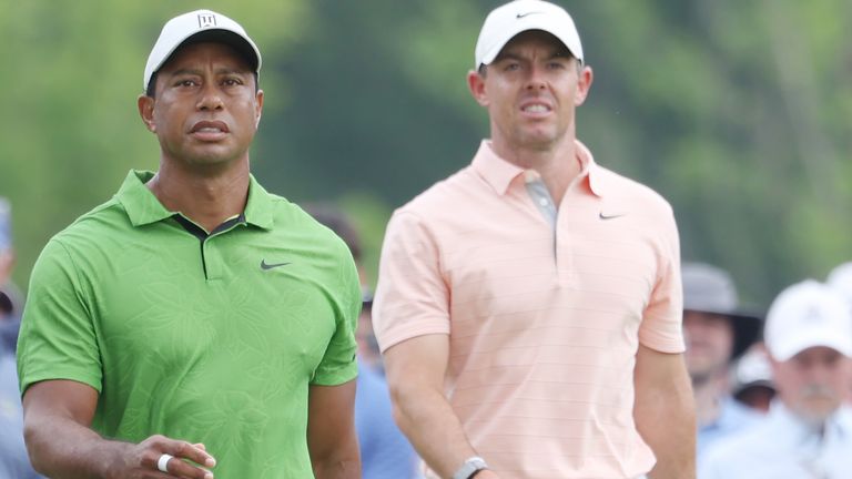Tiger Woods and Rory McIlroy on the course at Southern Hill Country Club during the second round of the PGA Championship