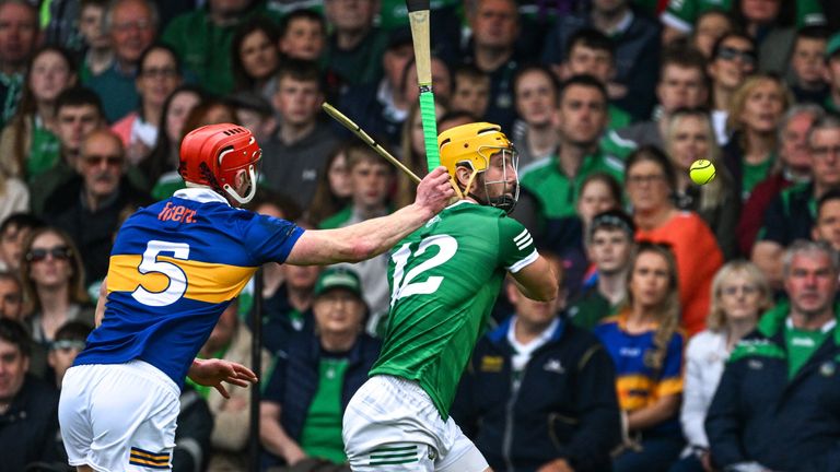 8 May 2022; Tom Morrisey of Limerick is tackled by Dillon Quirke of Tipperary during the Munster GAA Hurling Senior Championship Round 3 match between Limerick and Tipperary at TUS Gaelic Grounds in Limerick. Photo by Ray McManus/Sportsfile