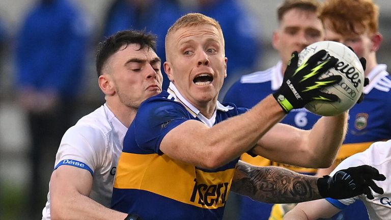 30 April 2022; Teddy Doyle of Tipperary in action against Waterford players, from left, Darragh Corcoran, Jason Curry and Tom O...Connell during the Munster GAA Senior Football Championship Quarter-Final match between Waterford and Tipperary at Fraher Field in Dungarvan, Waterford. Photo by Seb Daly/Sportsfile