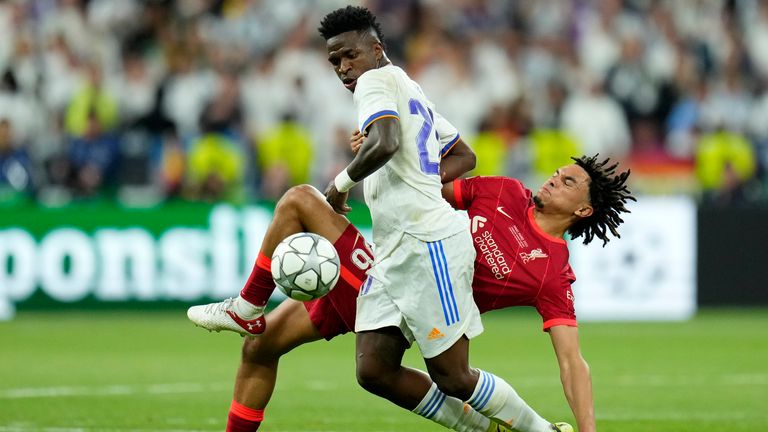 Liverpool&#39;s Trent Alexander-Arnold fights for the ball with Real Madrid&#39;s Vinicius Junior, left, during the Champions League final soccer match between Liverpool and Real Madrid at the Stade de France in Saint Denis near Paris, Saturday, May 28, 2022. (AP Photo/Manu Fernandez)