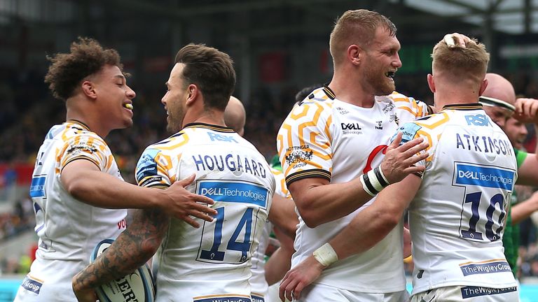 Wasps' Charlie Atkinson (right) celebrates after scoring a try against London Irish