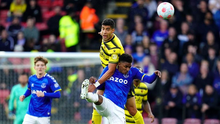 Adam Masina rises above Demarai Gray