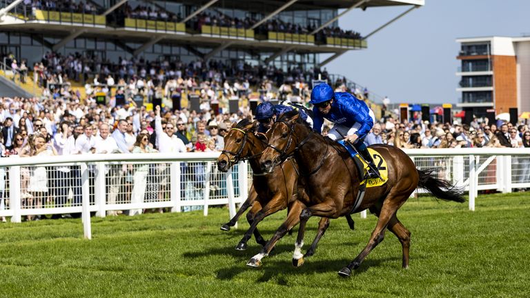 Wild Beauty wins the Dubai Duty Free Stakes at Newbury