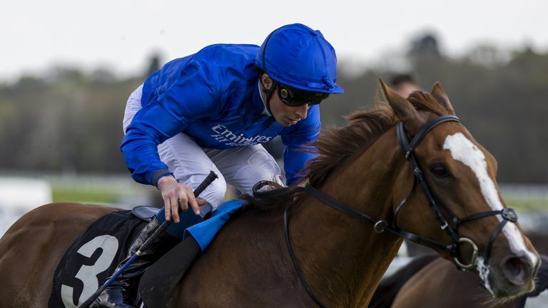 William Buick riding Modern News to victory in the Spring Cup at Newbury