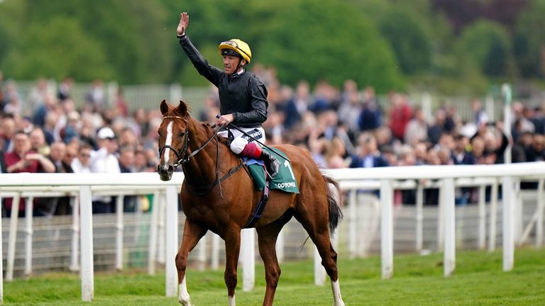 Frankie Dettori waves to the audience after winning the Paddy Power Yorkshire Cup on Stradivarius