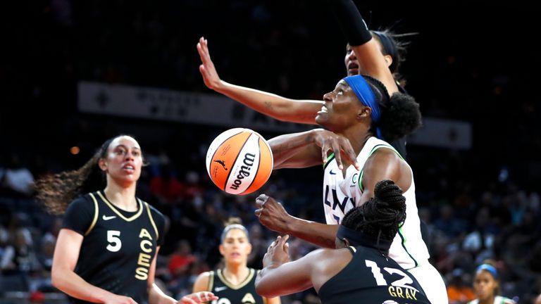 Minnesota Lynx center Sylvia Fowles fights for a rebound between Las Vegas Aces forward A&#39;ja Wilson and guard Chelsea Gray (12) during a WNBA basketball game in Las Vegas on Thursday, May 19, 2022.