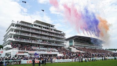 Fireworks are let off at Epsom before the Derby