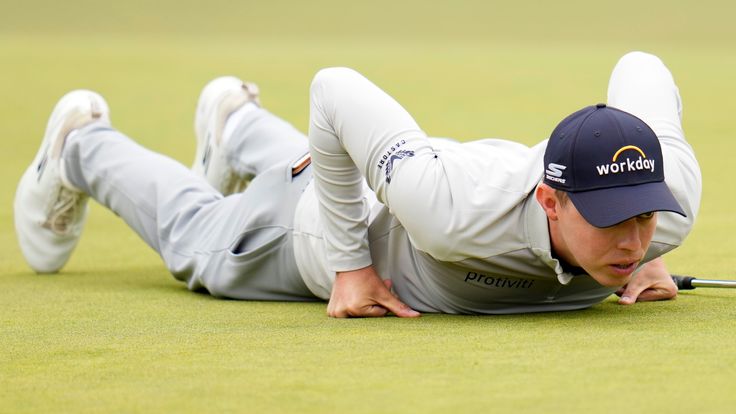 Matthew Fitzpatrick, of England, lines up a putt on the second hole during the final round of the U.S. Open golf tournament at The Country Club, Sunday, June 19, 2022, in Brookline, Mass. (AP Photo/Julio Cortez) 