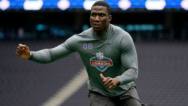 Houston Texans defensive end Adedayo Odeleye (75) gets past San