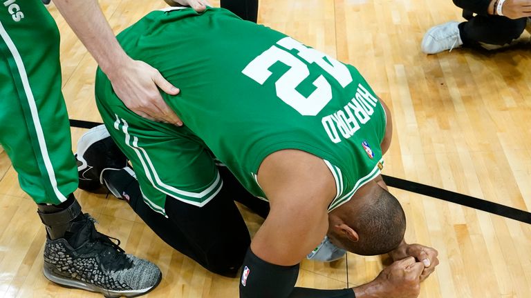 Boston Celtics big man Al Horford falls to his knees after winning Game 7 of the Eastern Conference Finals