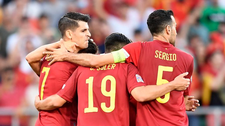 Spain's Alvaro Morata, left, celebrates after scoring the opening goal during the UEFA Nations League soccer match between Spain and Portugal, at the Benito Villamarin Stadium, in Seville, Spain