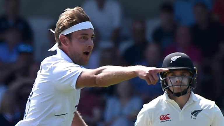 England's Stuart Broad, left, celebrates the dismissal of New Zealand's Tom Latham, right, during the first day of the third cricket test match between England and New Zealand at Headingley in Leeds, England, Thursday, June 23, 2022. (AP Photo/Rui Vieira)