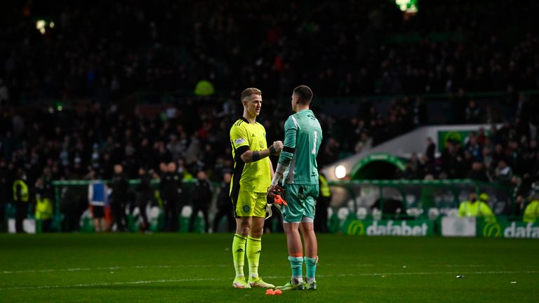 GLASGOW, SCOTLAND - JANUARY 29: Celtic's Joe Hart (L) and Dundee United's Benjamin Siegrist at full time during a cinch Premiership match between Celtic and Dundee United at Celtic Park, on January 29, 2022, in Glasgow, Scotland.  (Photo by Rob Casey / SNS Group)