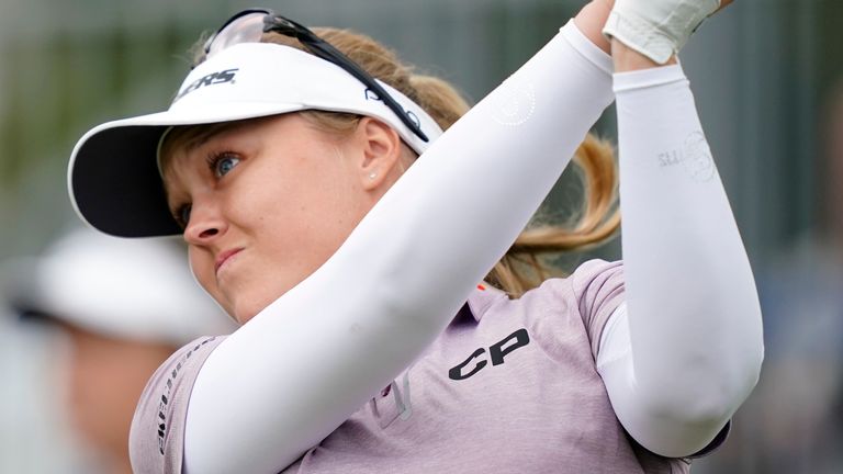 Brooke M. Henderson, of Canada, watches her shot off the first tee during the final round of the ShopRite LPGA Classic golf tournament, Sunday, June 12, 2022, in Galloway, N.J. (AP Photo/Matt Rourke)