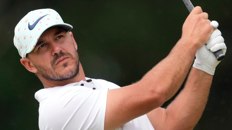 Brooks Koepka watches his shot on the 11th hole during the second round of the U.S. Open golf tournament at The Country Club, Friday, June 17, 2022, in Brookline, Mass. (AP Photo/Robert F. Bukaty)