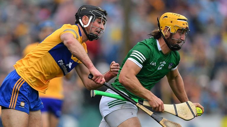 5 June 2022; Tom Morrisey of Limerick is tackled by Cathal Malone of Clare during the Munster GAA Hurling Senior Championship Final match between Limerick and Clare at Semple Stadium in Thurles, Tipperary. Photo by Ray McManus/Sportsfile