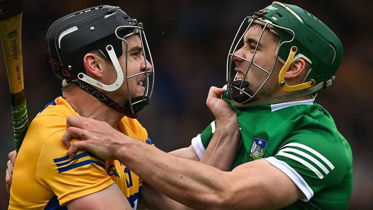 5 June 2022; Tony Kelly of Clare, left, and Se..n Finn of Limerick during the Munster GAA Hurling Senior Championship Final match between Limerick and Clare at FBD Semple Stadium in Thurles, Tipperary. Photo by Brendan Moran/Sportsfile