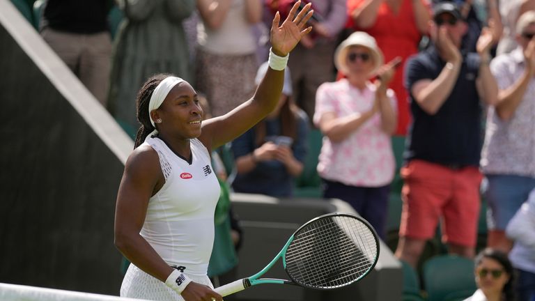 Coco Gauff of the US celebrates defeating Romania's Elena-Gabriela Ruse in a singles tennis match on day two of the Wimbledon tennis championships in London, Tuesday, June 28, 2022. (AP Photo/Alastair Grant)