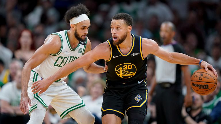 Golden State Warriors guard Stephen Curry (30) drives against Boston Celtics guard Derrick White (9) during the second quarter of Game 4 of basketball&#39;s NBA Finals, Friday, June 10, 2022, in Boston. (AP Photo/Steven Senne)


