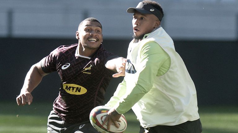 Damian Willemse (L) fight for the ball with South Africa's fly-half Elton Jantjies during the Springboks training session in Cape Town, on July 23, 2021 ahead of the first test match against British and Irish Lions on July 24. - - -- IMAGE RESTRICTED TO EDITORIAL USE - STRICTLY NO COMMERCIAL USE -- (Photo by Luigi BENNETT / POOL / AFP) / -- IMAGE RESTRICTED TO EDITORIAL USE - STRICTLY NO COMMERCIAL USE -- (Photo by LUIGI BENNETT/POOL/AFP via Getty Images)