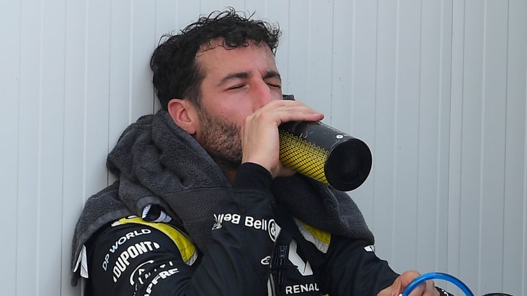 Renault driver Daniel Ricciardo of Australia drinks after the Formula One Grand Prix at the Barcelona Catalunya racetrack in Montmelo, Spain, Sunday, Aug. 16, 2020. (Josep Lago, Pool via AP)