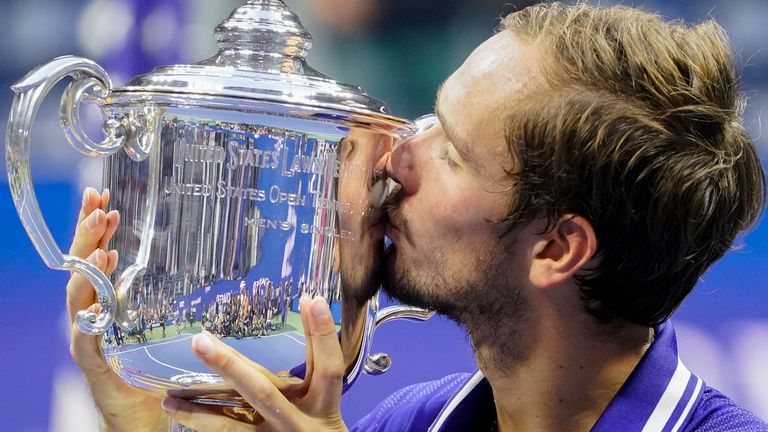 Daniil Medvedev, of Russia, kisses the championship trophy after defeating Novak Djokovic, of Serbia, during the men's singles final of the US Open tennis championship, Sunday, September 12, 2021, in New York.  The US Open will allow players from Russia and Belarus to compete this year despite the ongoing invasion of Ukraine that has banned Wimbledon.  (AP Photo / John Minchillo, File)