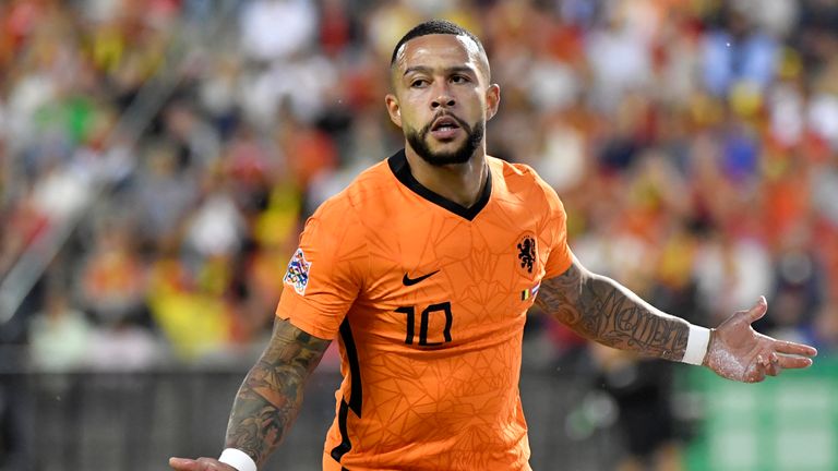 Netherlands' Memphis Depay celebrates after scoring his side's second goal during the UEFA Nations League soccer match between Belgium and the Netherlands, at the King Baudouin Stadium in Brussels, Friday, June 3, 2022. (AP Photo/Geert Vanden Wijngaert)