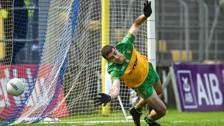 Caolan McGonagle attempts to save the penalty