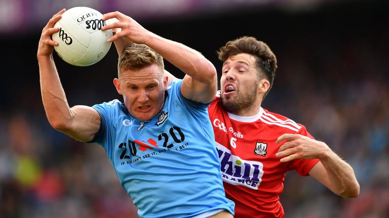 13 July 2019; Ciarán Kilkenny of Dublin catches the ball under pressure from Tom..s Clancy of Cork during the GAA Football All-Ireland Senior Championship Quarter-Final Group 2 Phase 1 match between Dublin and Cork at Croke Park in Dublin. Photo by Ray McManus/Sportsfile