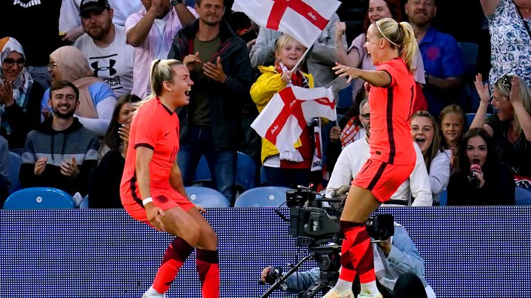 Lauren Hemp and Beth Mead celebrate for England