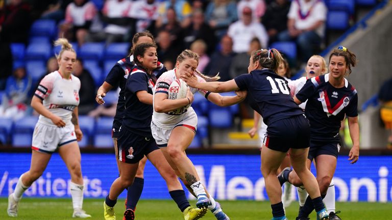 England�s Caitlin Beevers is tackled by France�s Gaelle Alvernhe during the Women&#39;s International match at the Halliwell Jones Stadium, Warrington. Picture date: Saturday June 18, 2022.