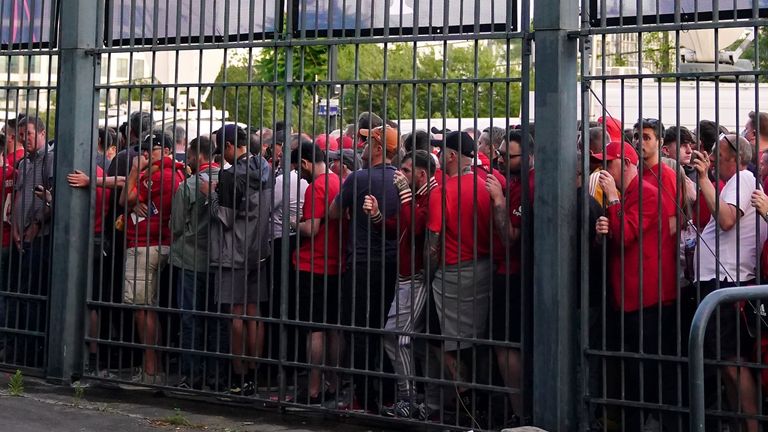 Liverpool fans stuck outside the ground as the kick off is delayed during the UEFA Champions League Final at the Stade de France