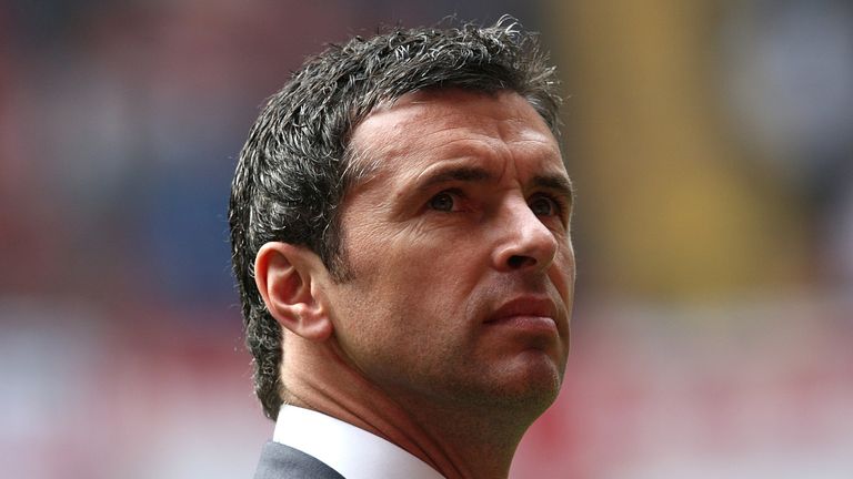 Gary Speed looks on before kick-off of Wales&#39; game against England at the Millennium Stadium.