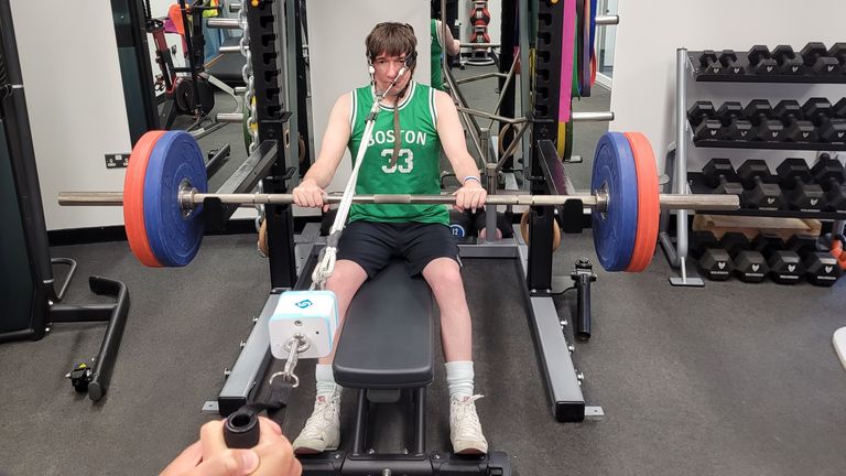 Sky Sports journalist Marc Bazeley undergoes a neck strength test