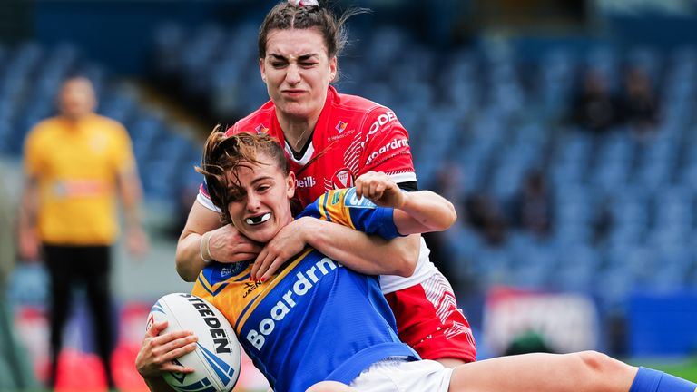 Picture by Alex Whitehead/SWpix.com - 07/05/2022 - Rugby League - Betfred Women’s Challenge Cup Final - Leeds Rhinos v St Helens - Elland Road, Leeds, England - Leeds’ Fran Goldthorp is tackled by St Helens’ Leah Burke.