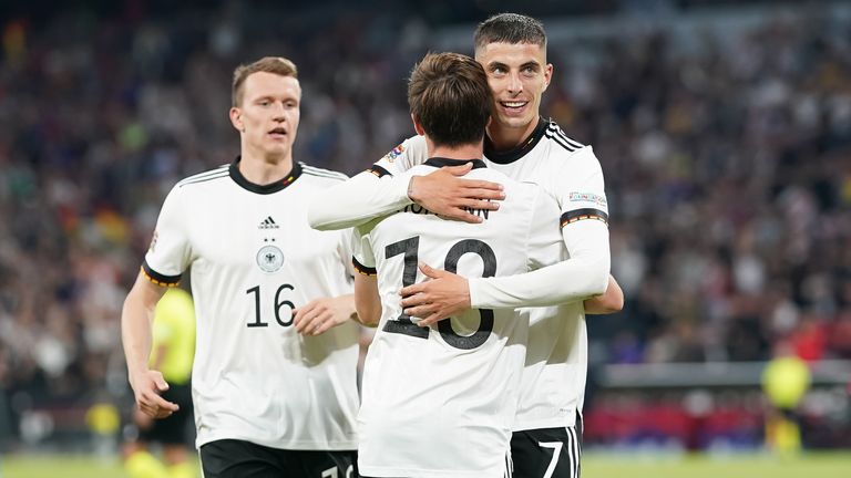 Kai Havertz congratulates Jonas Hofmann after he equalised for Germany in Hungary