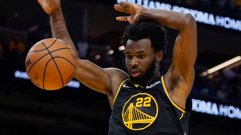 Golden State Warriors forward Andrew Wiggins dunks against the Dallas Mavericks during the second half of Game 5 of the Western Conference Finals in San Francisco
