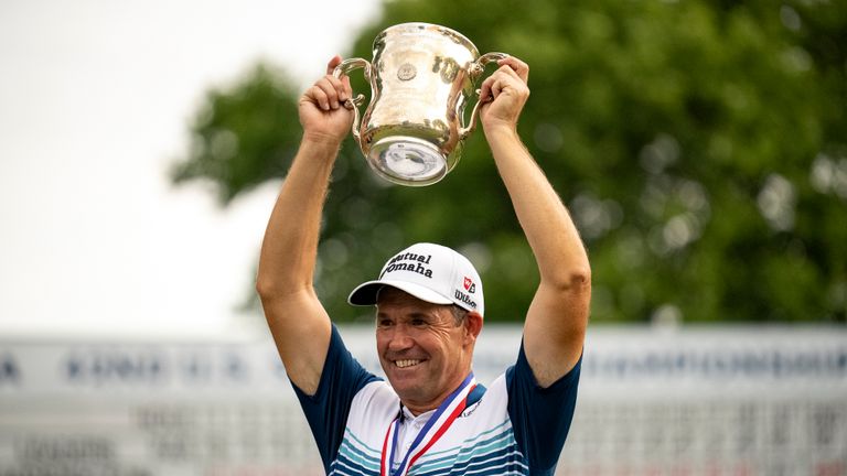 Padraig Harrington holds the Francis D. Ouimet Memorial Trophy after winning the U.S. Senior Open golf championship Sunday, June 26, 2022, at Saucon Valley Country Club in Bethlehem, Pa.