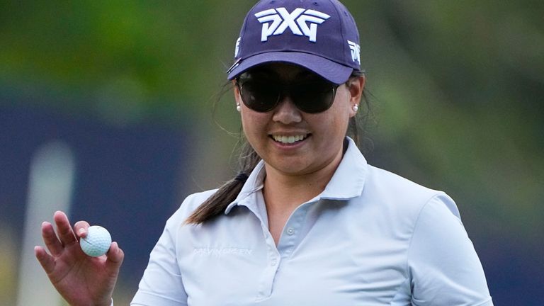 Mina Harigae reacts to saving Par on the 18th green during the first round of the US Women's Open