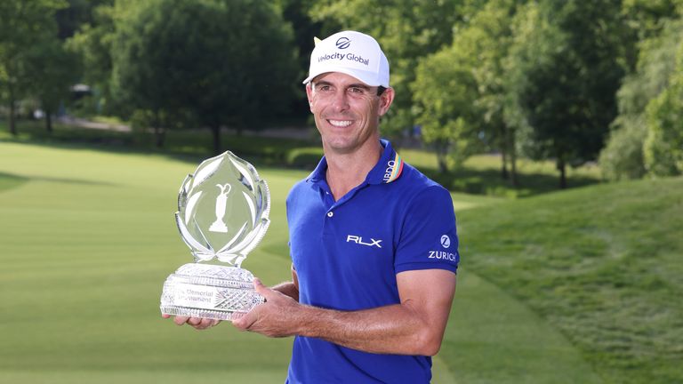 Billy Horschel stands with the trophy after winning the Memorial Tournament