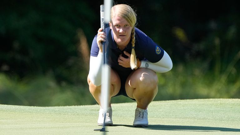 Ingrid Lindblad, of Sweden, lines up a putt on the 11th green during the first round of the U.S. Women's Open golf tournament at the Pine Needles Lodge & Golf Club in Southern Pines, N.C. on Thursday, June 2, 2022. (AP Photo/Chris Carlson)