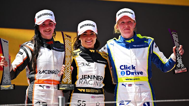 Race winner Jamie Chadwick of Great Britain and Jenner Racing (C) Second placed Abbi Pulling of Great Britain and Racing X (L) and Third placed Alice Powell 