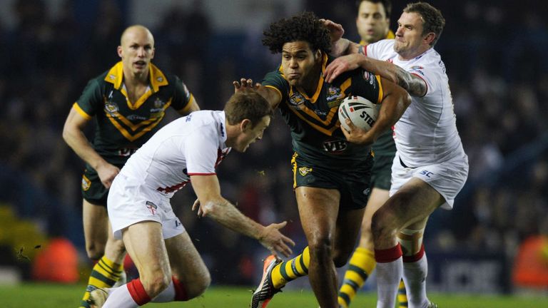 LEEDS, ENGLAND - NOVEMBER 19:  Sam Thaiday of Australia is tackled by Jamie Peacock and James Roby of England during the Four Nations Final between England and Australia at Elland Road on November 19, 2011 in Leeds, United Kingdom.  (Photo by Gareth Copley/Getty Images)