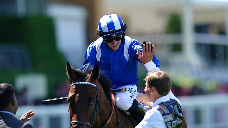 Crowley high fives Baaeed's groom after winning at Royal Ascot