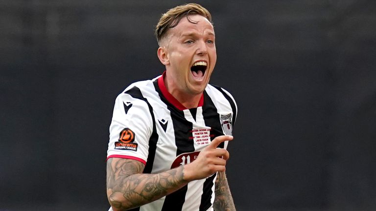 Jordan Maguire-Drew celebrates scoring his side's second goal during the National League playoff final