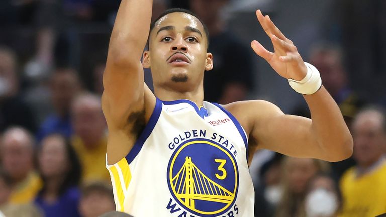 Golden State Warriors guard Jordan Poole (3) shoots against the Boston Celtics during the first half of Game 1 of basketball&#39;s NBA Finals in San Francisco, Thursday, June 2, 2022. (AP Photo/Jed Jacobsohn)