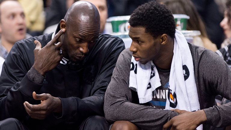 Kevin Garnett dishes out pearls of wisdoms to a young Andrew Wiggins on the Minnesota Timberwolves bench