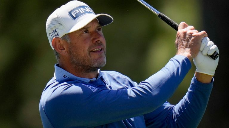 Lee Westwood, of England, watches his shot on the first fairway during the final round at the Masters golf tournament on Sunday, April 10, 2022, in Augusta, Ga. (AP Photo/Jae C. Hong)