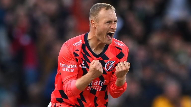 Lightning bowler Matthew Parkinson celebrates after taking the wicket of Joe Root during the Vitality T20 Blast match between Lancashire Lightning and Yorkshire Vikings at Emirates Old Trafford on May 27, 2022 in Manchester, England. (Photo by Stu Forster/Getty Images)